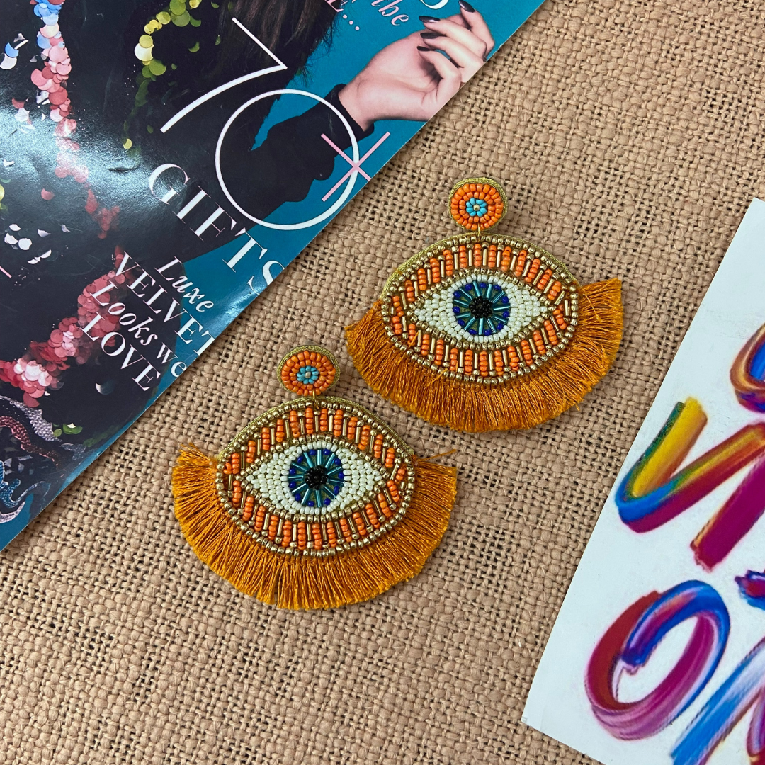 Evil Eye Tangerine Tassel Earrings