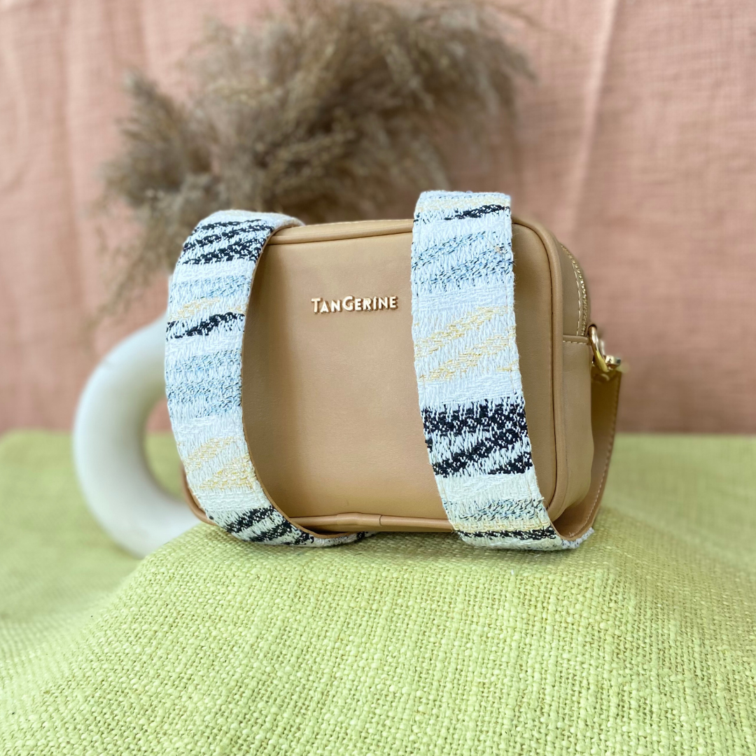 Beige Dual Compartment Bag with White Tribal Belt.