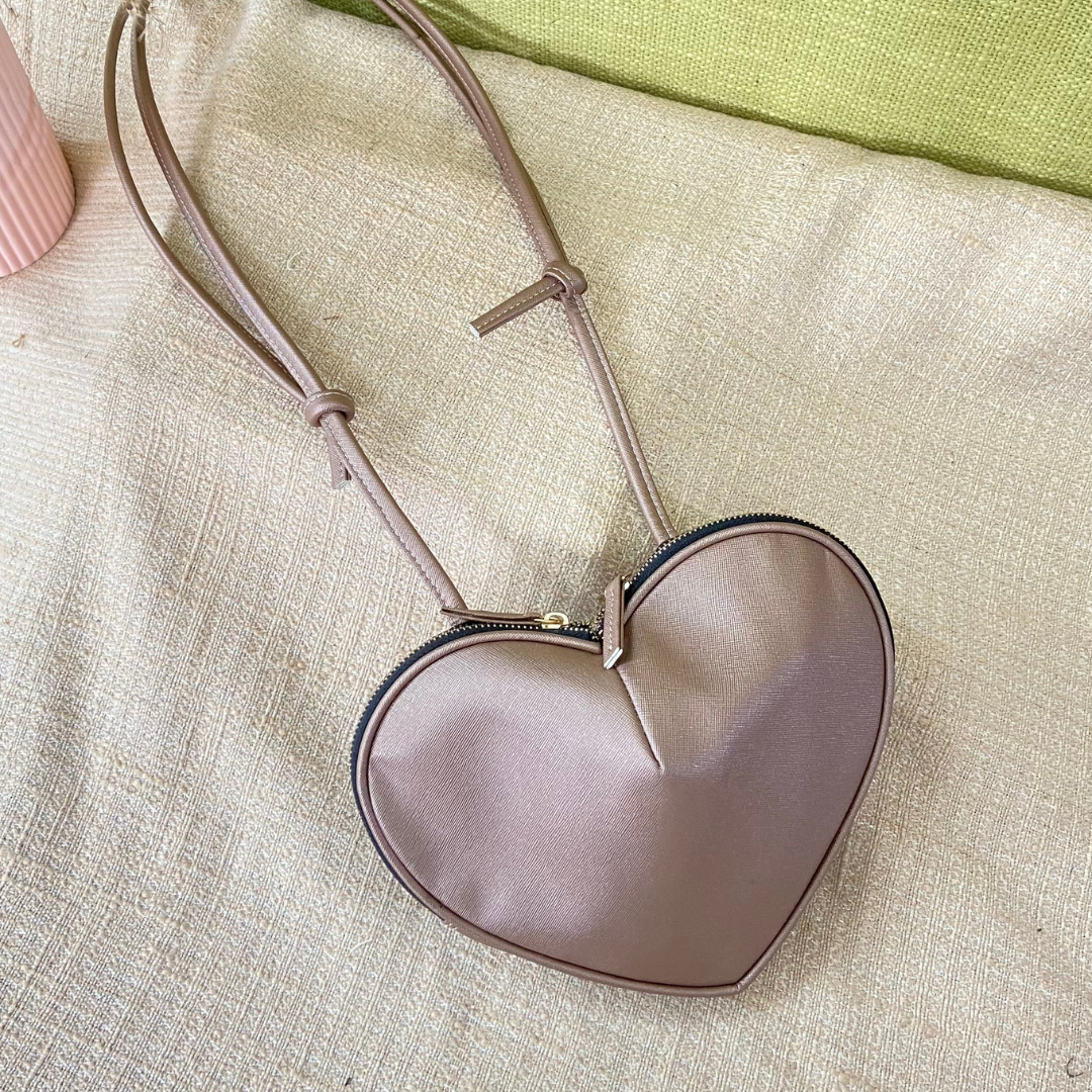 Rose gold top sling bag