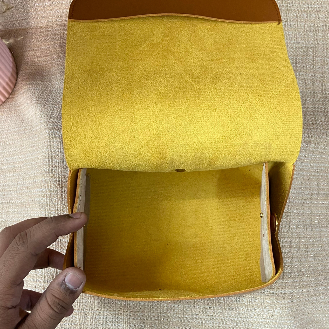 Tan Eva Bag with Vibrant Belt.