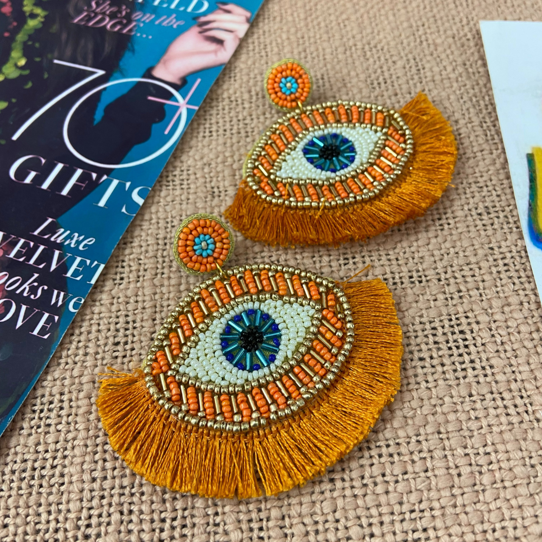 Evil Eye Tangerine Tassel Earrings