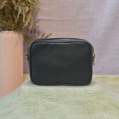 Black Dual Compartment Sling Bag with Black Diamond belt.