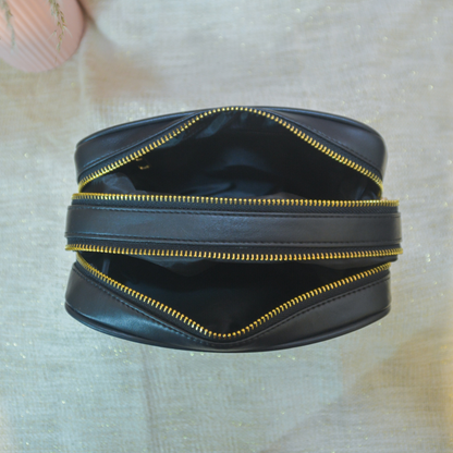 Black Dual Compartment Sling Bag with Black Diamond belt.