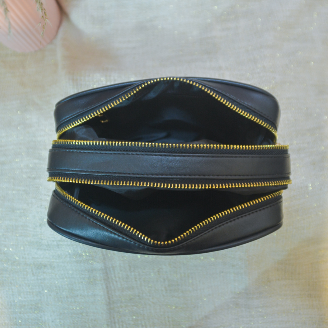 Black Dual Compartment Sling Bag with Black Diamond belt.