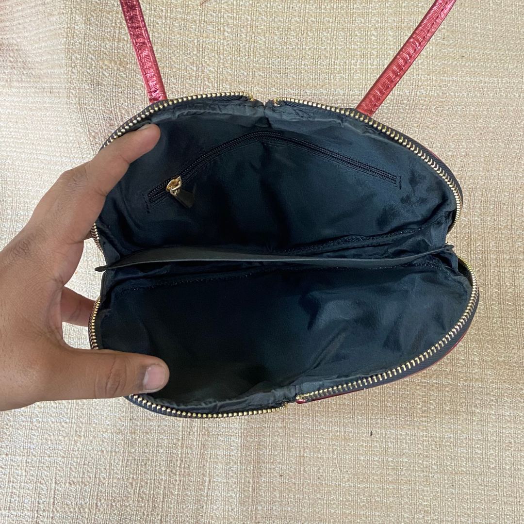 Glossy sling discount bag
