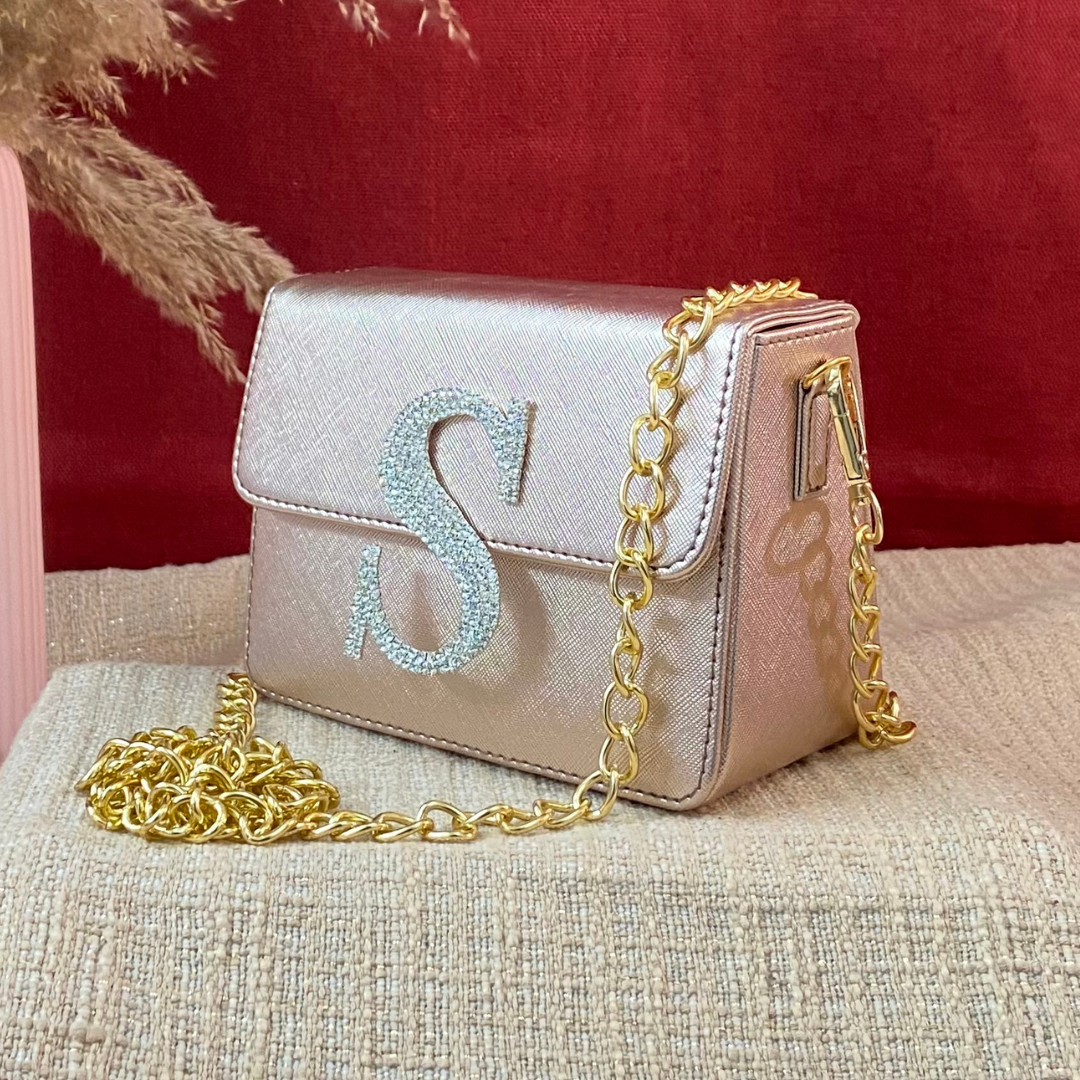 Rose gold top sling bag